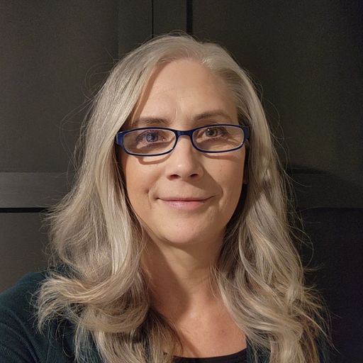 A headshot image of Lori Sanders