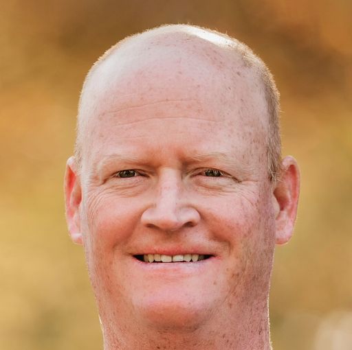 A headshot image of Rob Starkey
