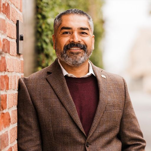 A headshot image of Arturo Morales