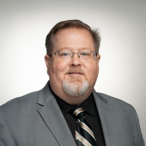 A headshot image of Daniel Gann