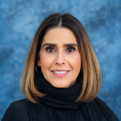 A headshot image of Marisa Farnsworth