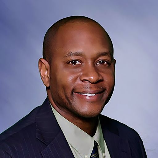 A headshot image of Merland Baker
