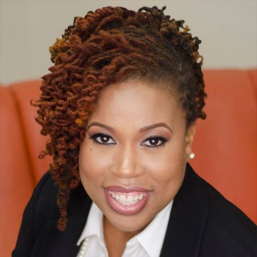 A headshot image of Dhaima Chin