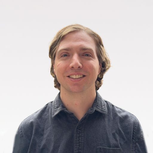 A headshot image of Aaron Hatcher