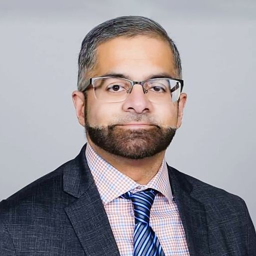 A headshot image of Zeeshan Choudhry