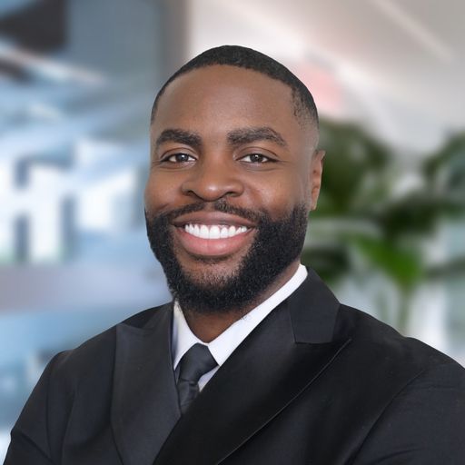 A headshot image of Lawrence Oke