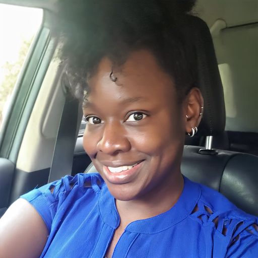 A headshot image of Abria Green