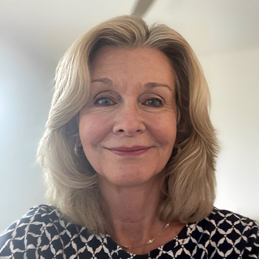 A headshot image of Joyce Caroll