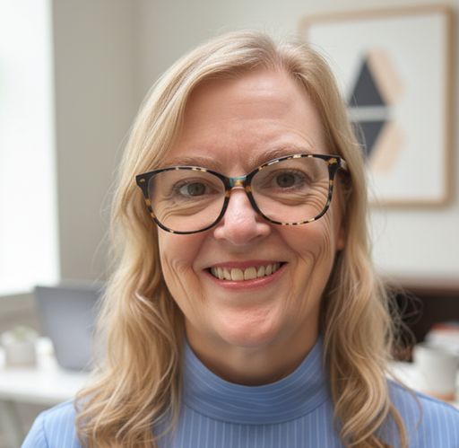 A headshot image of Janette Isaacson