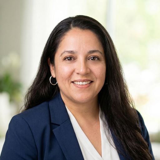 A headshot image of Iris Caballero