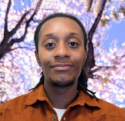 A headshot image of Darien Dyer