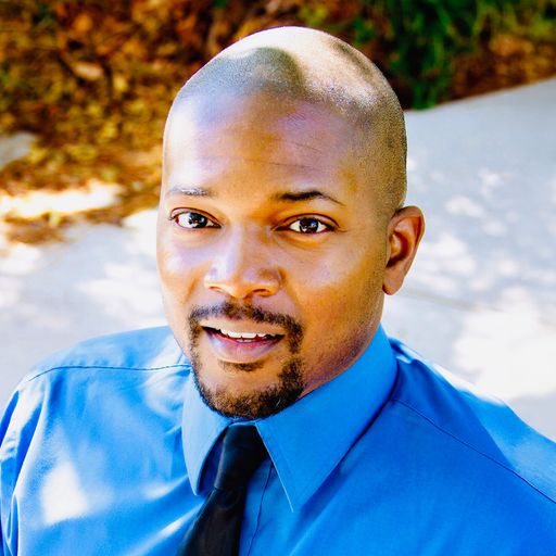 A headshot image of Kashif Brown