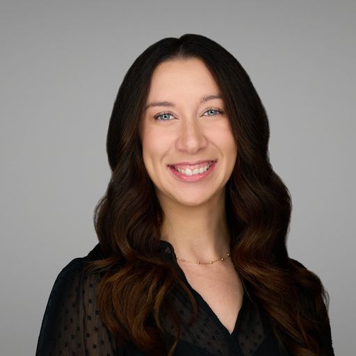 A headshot image of Ashley Harding