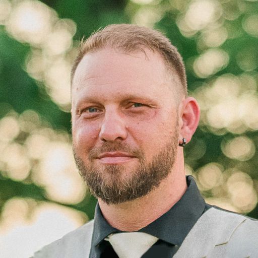 A headshot image of Brett Davis