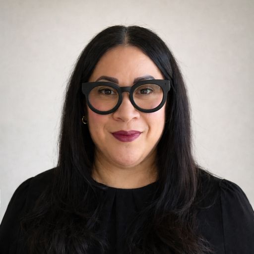 A headshot image of Aimee Ismerio