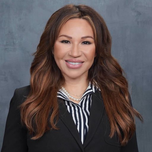 A headshot image of Nelly Johnson