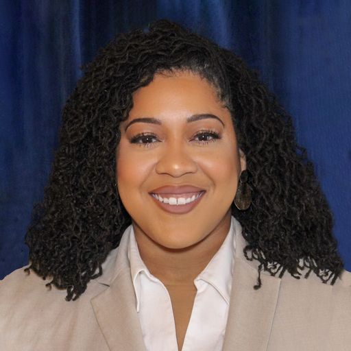 A headshot image of Melanie Curtis