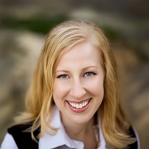 A headshot image of JENNIFER REYNOLDS