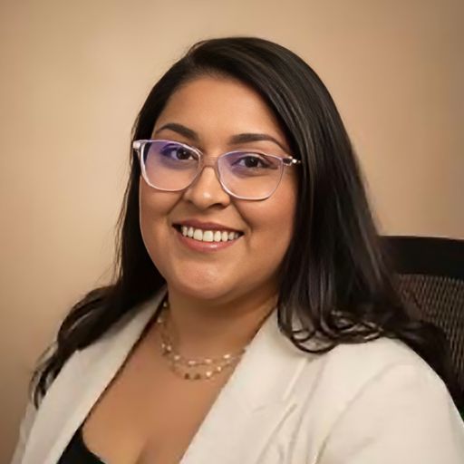 A headshot image of Mariela Caceres