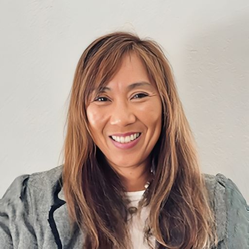 A headshot image of Regina Sueoka