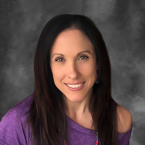 A headshot image of Michele Clark