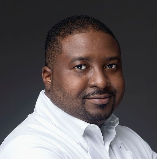 A headshot image of Henry Ibitokun