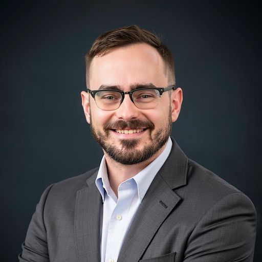 A headshot image of David Simons