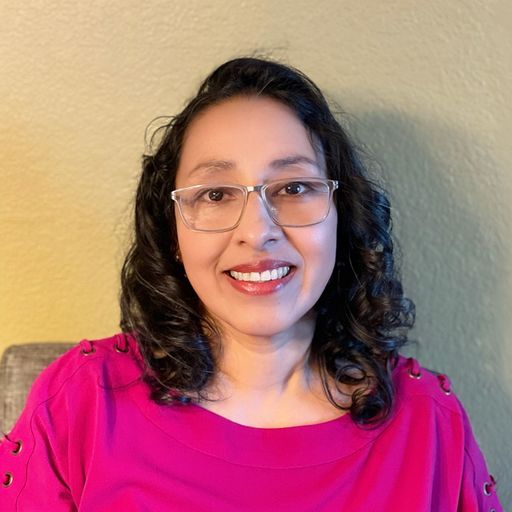 A headshot image of Janie Echeverria