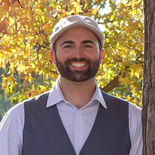 A headshot image of Paul Souza