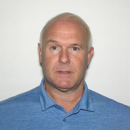A headshot image of Roger Green