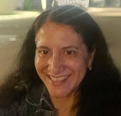 A headshot image of Maria Eugenia Llamas