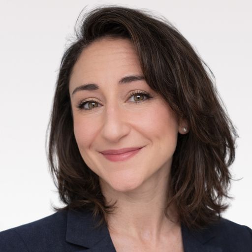A headshot image of Denielle Nesbitt