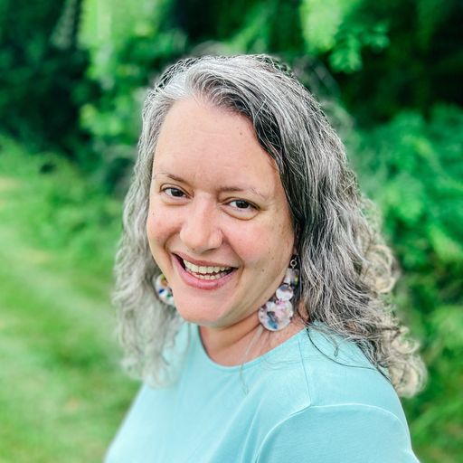 A headshot image of Marisa Jones