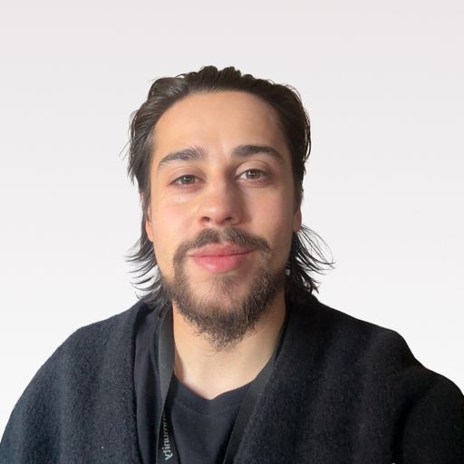 A headshot image of Joseph Kaplan