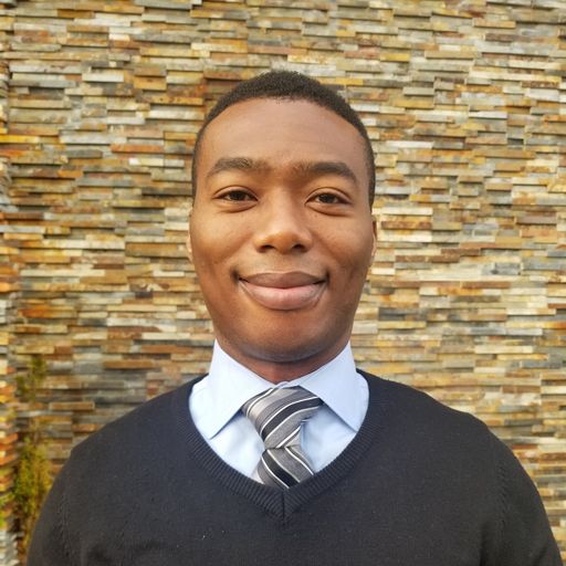 A headshot image of Emeka Anosike