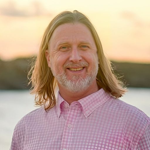 A headshot image of Nathan Aish