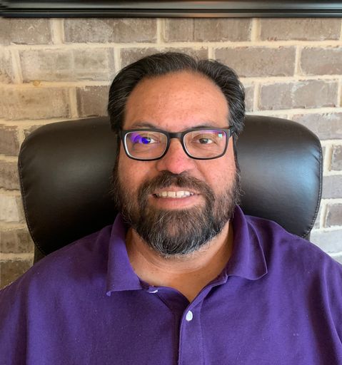 A headshot image of Ricardo Fraga