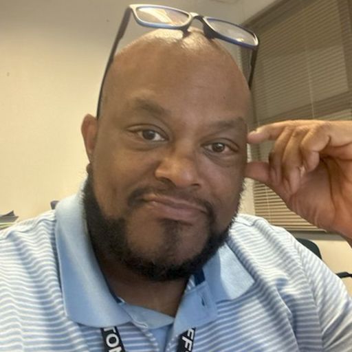 A headshot image of LeRoy Hughes