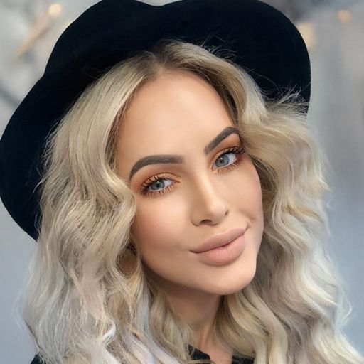 A headshot image of Tara Rainey