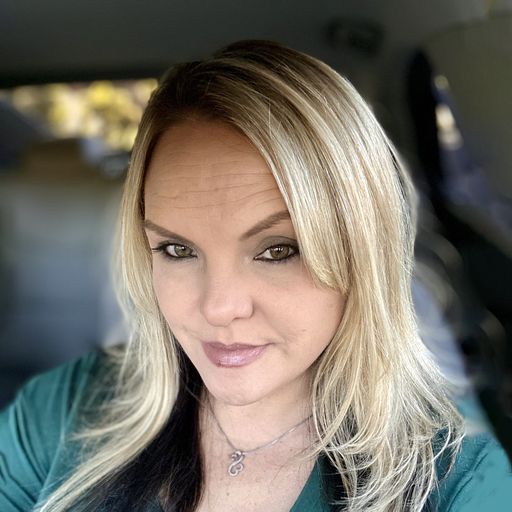 A headshot image of Amber Hayslett-Atkison