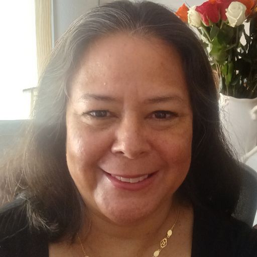 A headshot image of Lauren Greeley