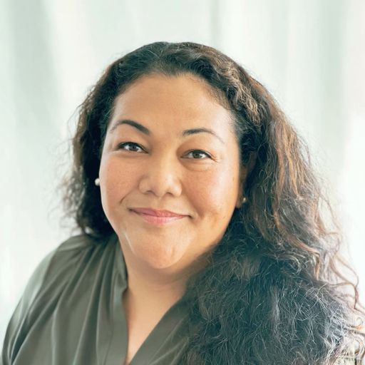 A headshot image of Dionne Malia Mahelona