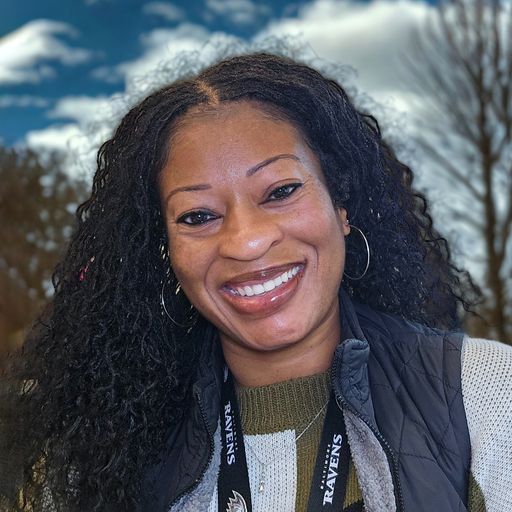 A headshot image of Jennifer Outlaw