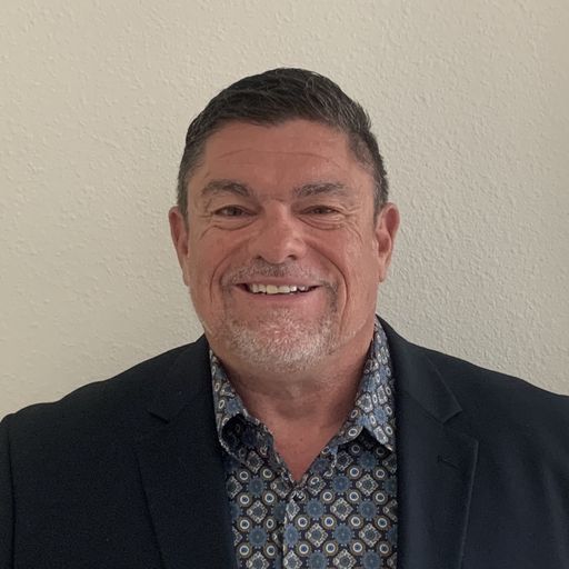 A headshot image of Darren Cooke