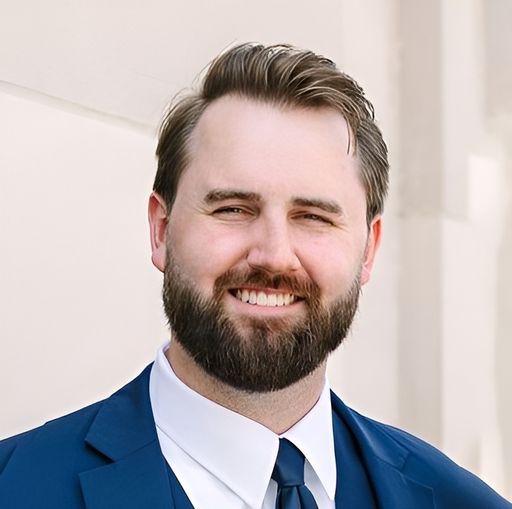 A headshot image of Mitchell Brauchla