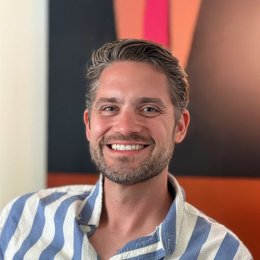 A headshot image of Travis Williams