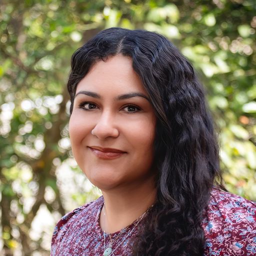 A headshot image of Enedina Cisneros
