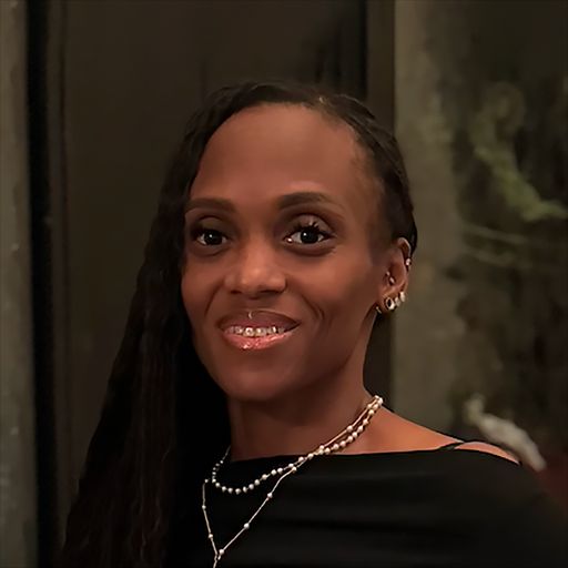 A headshot image of Summyji Groom