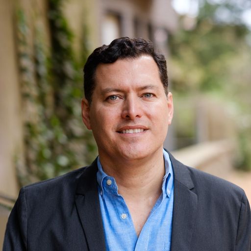 A headshot image of Jorge Villarroel