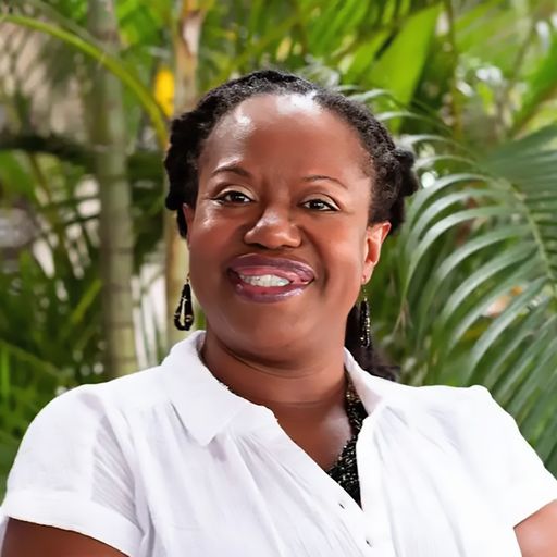 A headshot image of Tricia Antonio